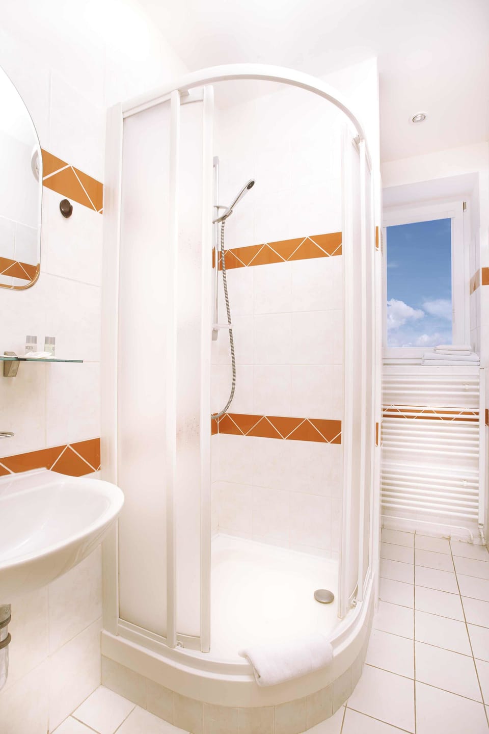 Shower, free toiletries, hair dryer, towels