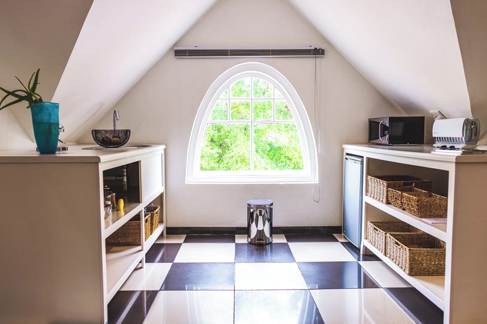 Loft Suite | Private kitchenette | Mini-fridge, electric kettle, highchair