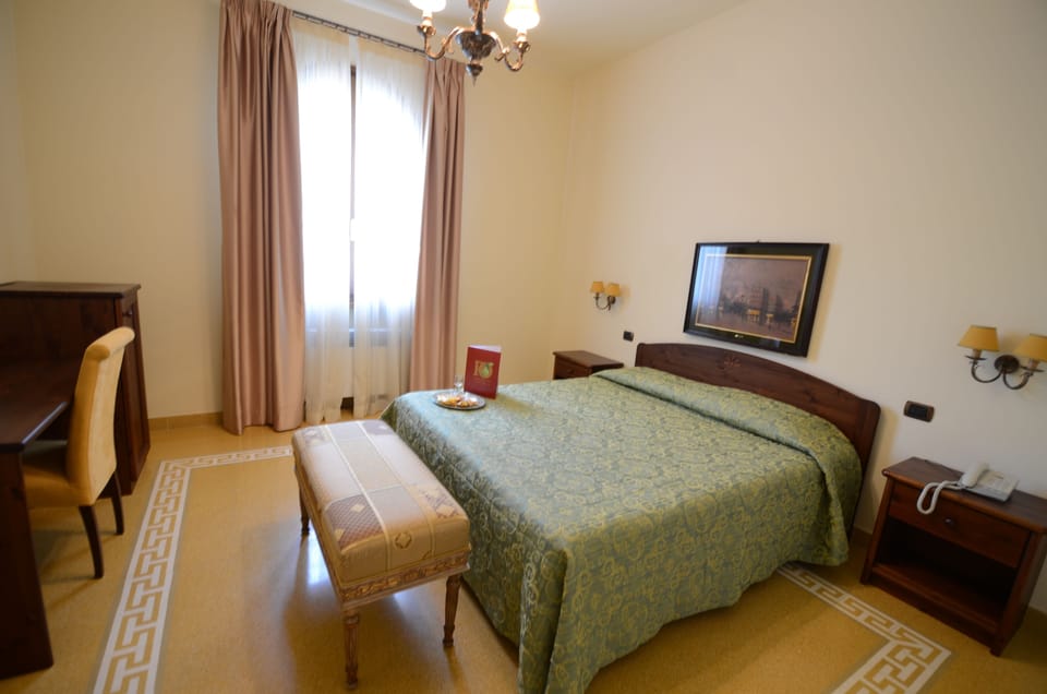 Double Room | Minibar, in-room safe, desk, iron/ironing board (on request)