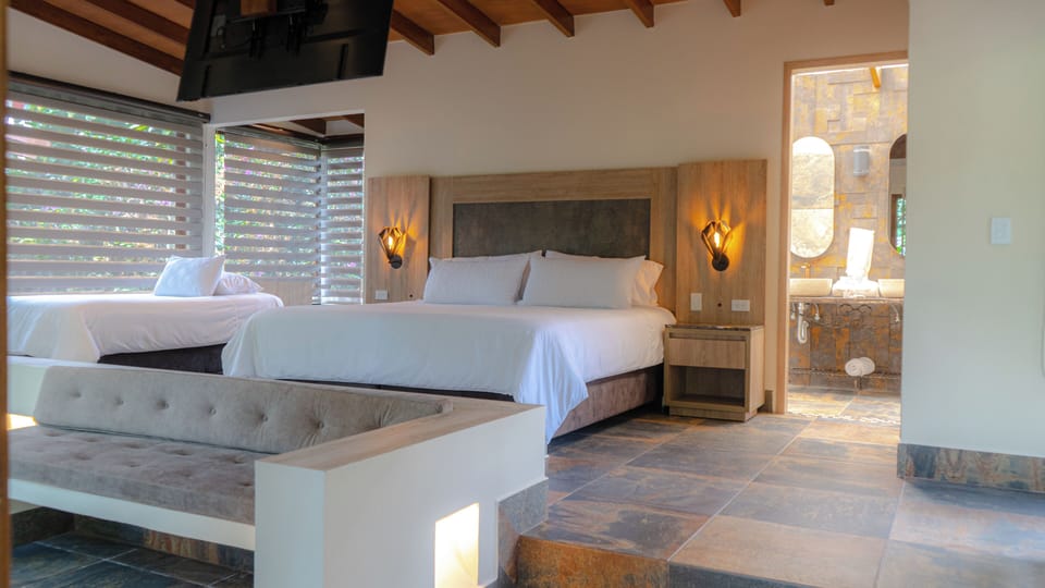 Deluxe Cabin | Egyptian cotton sheets, premium bedding, in-room safe, desk