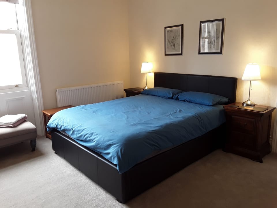 King Room & Shared Bathroom | Memory foam beds, desk, iron/ironing board, free WiFi