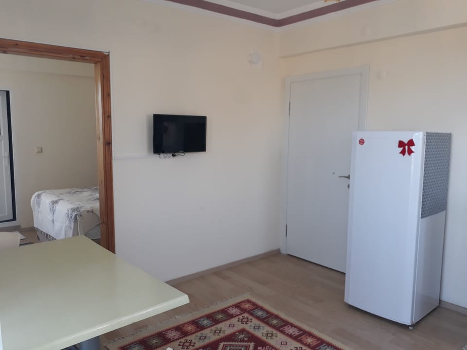 Standard Apartment, Partial Sea View | Premium bedding, desk, iron/ironing board, free WiFi