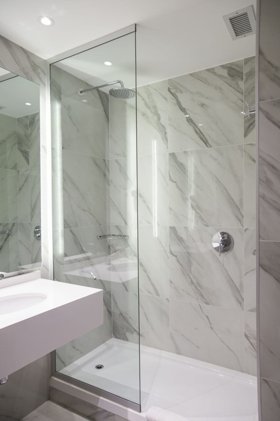 Bathtub, deep soaking tub, rainfall showerhead, hair dryer