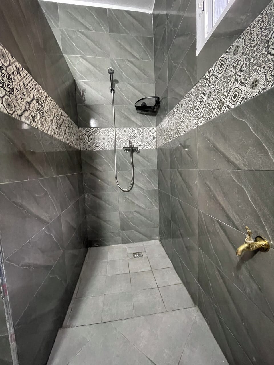 Family Room, Non Smoking, City View | Bathroom | Shower, hair dryer, towels