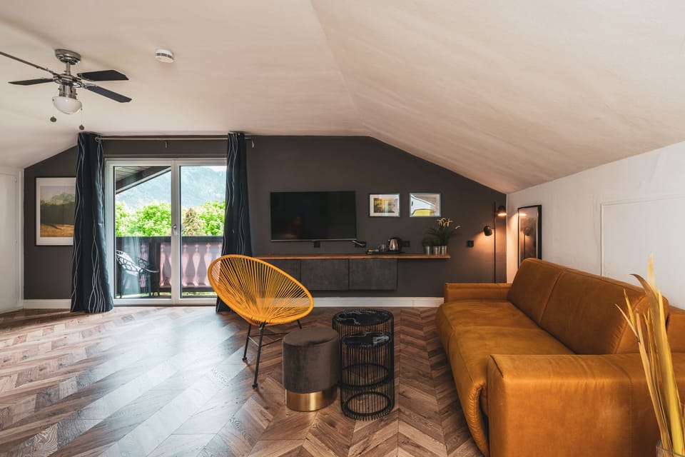 Superior Double Room | Living area | 50-inch Smart TV with satellite channels, TV, tablet