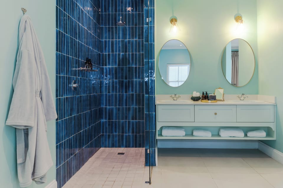 Suite, 1 King Bed, Poolside | Bathroom | Separate tub and shower, deep soaking tub, designer toiletries