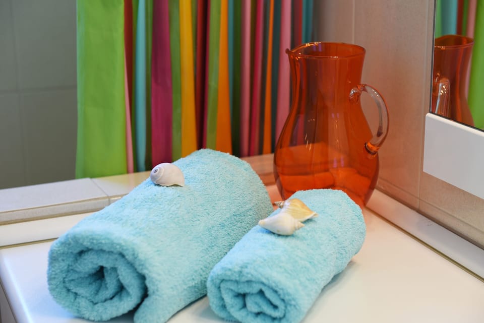 Apartment, 3 Bedrooms | Bathroom amenities | Shower, hair dryer, towels, soap