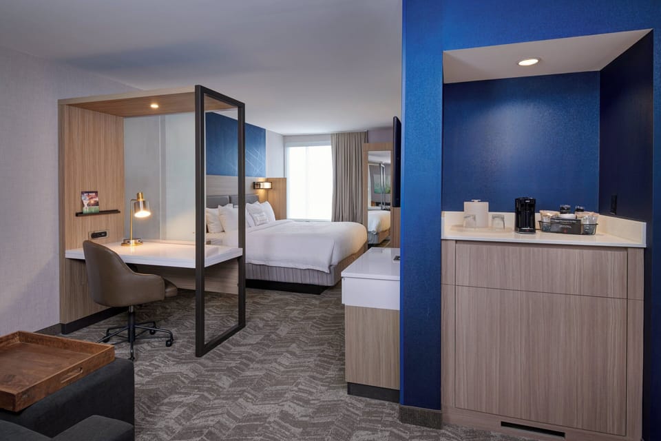 Premium bedding, pillowtop beds, desk, laptop workspace
