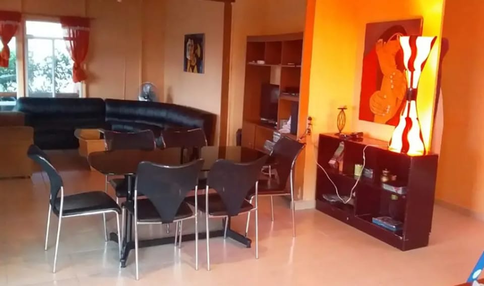 Family Cottage, Garden View | Living area | Flat-screen TV