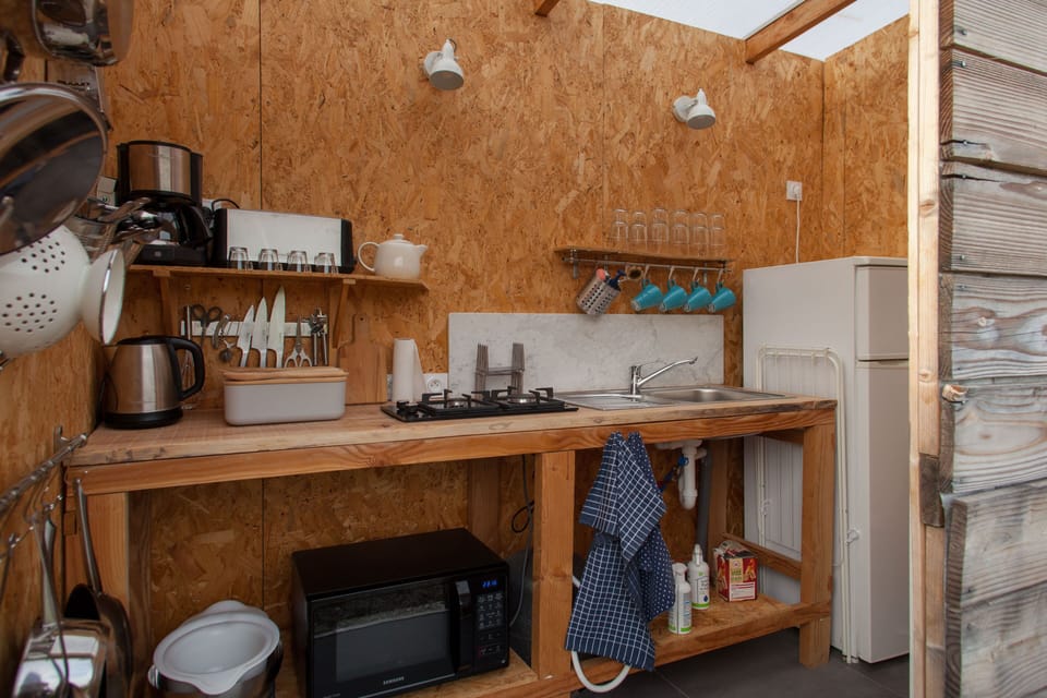 Full-size fridge, coffee/tea maker, electric kettle, toaster