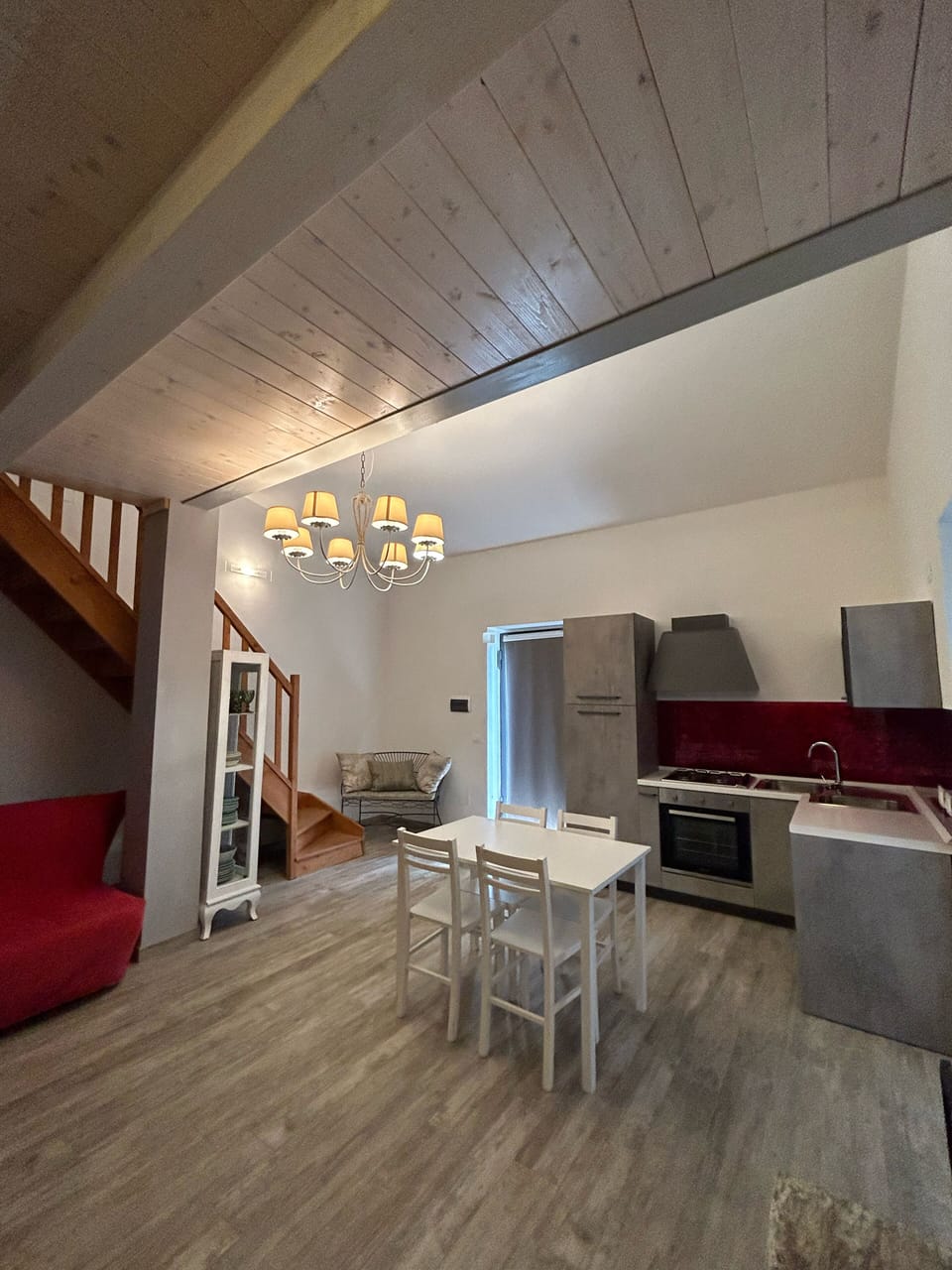 Appartamento "Il Giardino" | Living area | Flat-screen TV