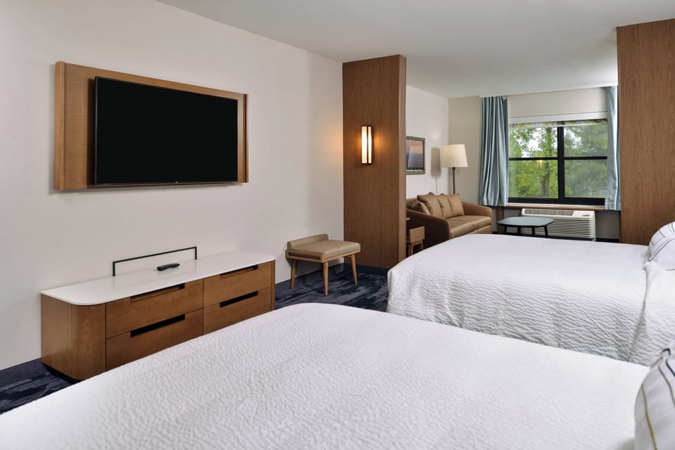 Down comforters, desk, laptop workspace, blackout drapes