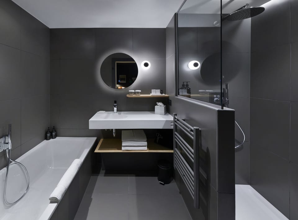 Combined shower/tub, hair dryer, bathrobes, slippers