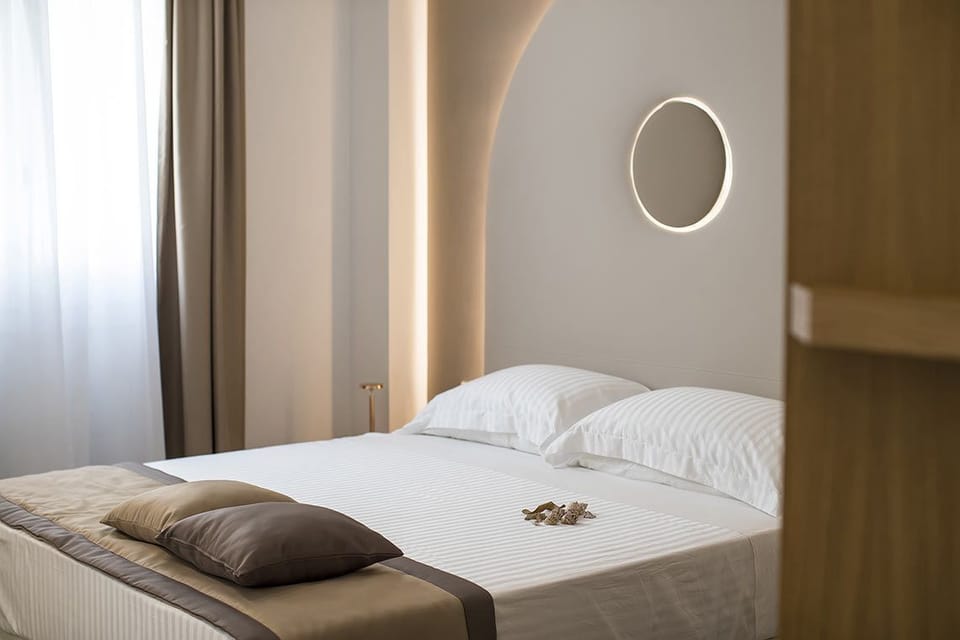 Double Room (Sabbia) | Minibar, in-room safe, desk, blackout drapes
