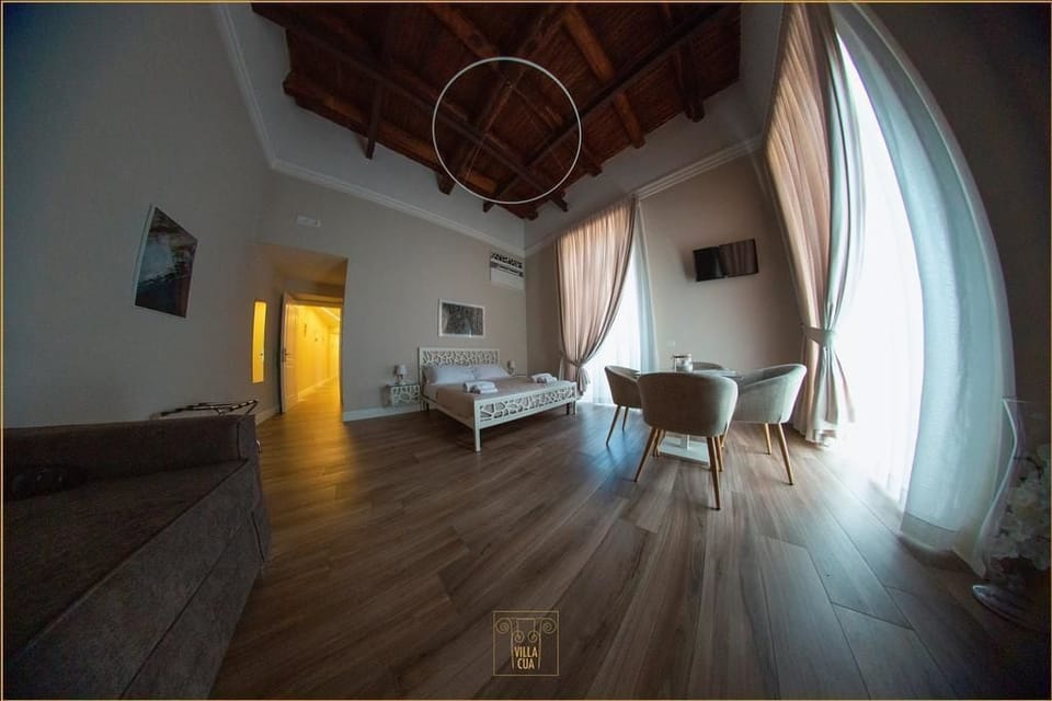 Deluxe Quadruple Room, 1 Double Bed with Sofa bed | Down comforters, in-room safe, desk, laptop workspace