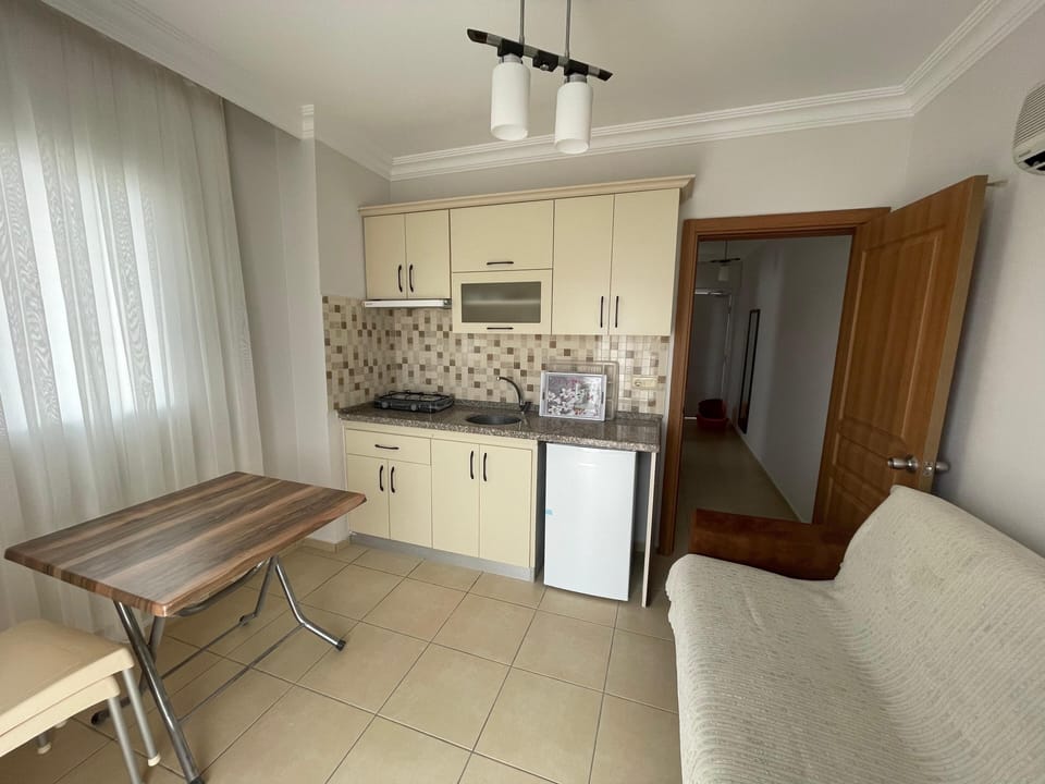 Apartment, Sea View | Private kitchen | Fridge