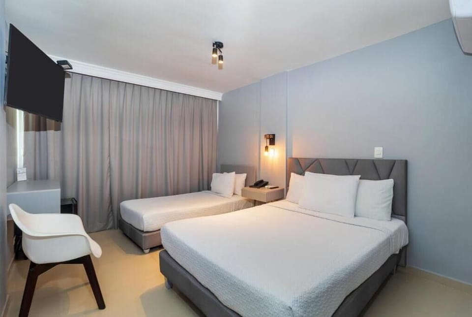 Standard Double or Twin Room | Desk, free cribs/infant beds, free WiFi, bed sheets