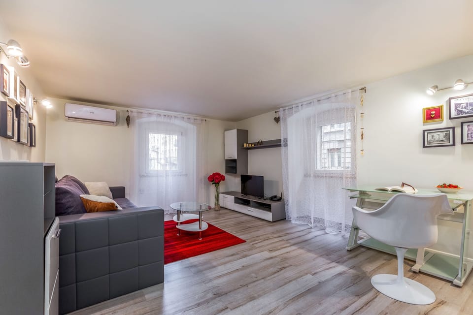 Apartment, 1 Bedroom | Living room | Flat-screen TV