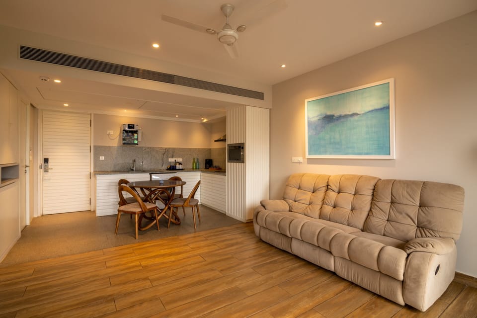Luxury Apartment, City View | Living area | Flat-screen TV