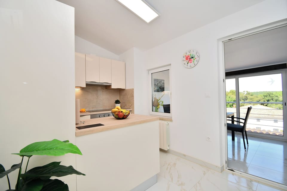 Apartment (A2) | Private kitchen | Espresso maker, fridge, microwave, stovetop