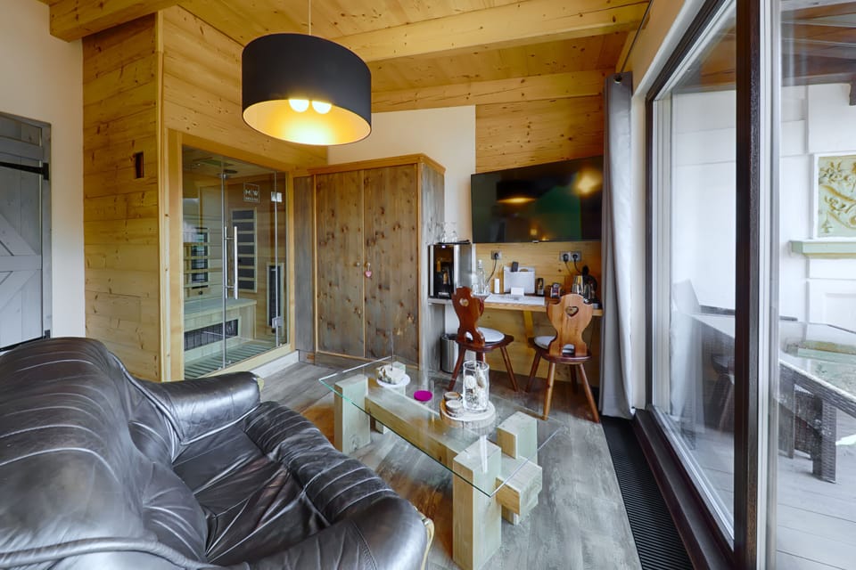 Deluxe Double Room, Sauna, Mountain View | In-room safe, individually decorated, desk, blackout drapes