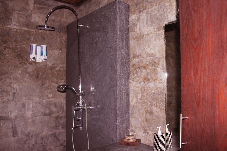 Shower, slippers, towels, soap