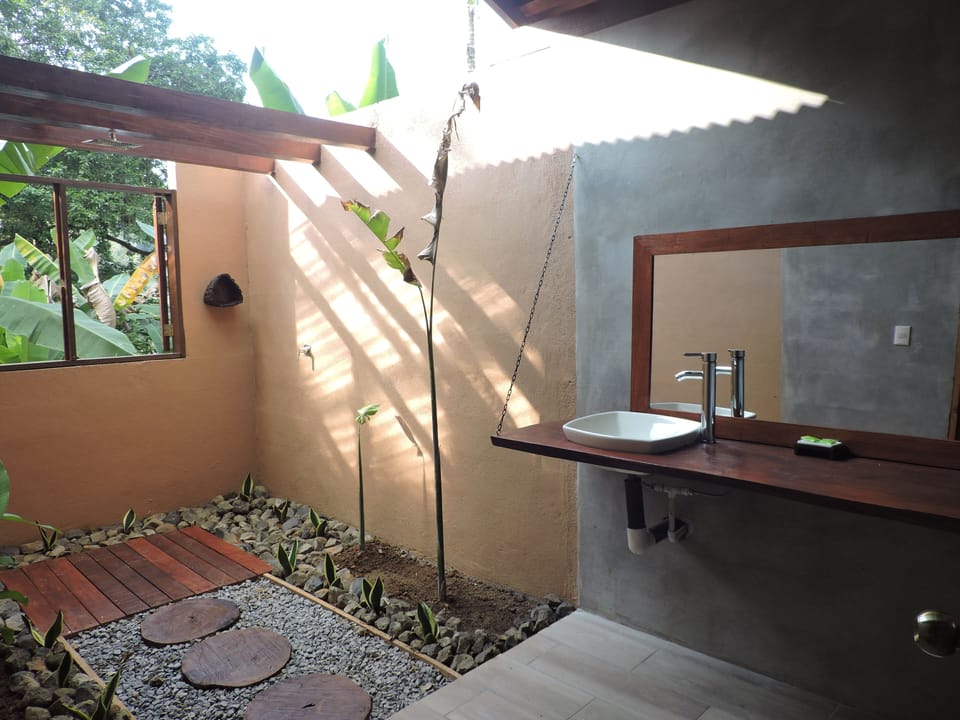 Deluxe Bungalow, 2 Queen Beds (Manu) | Bathroom | Shower, free toiletries, towels, soap
