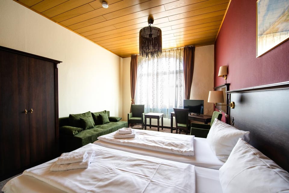 Hypo-allergenic bedding, desk, rollaway beds, free WiFi