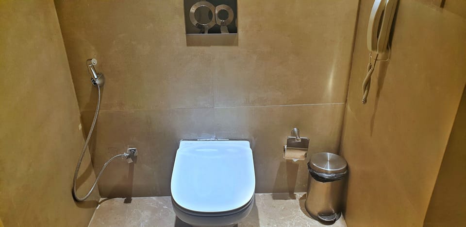 Shower, free toiletries, slippers, towels