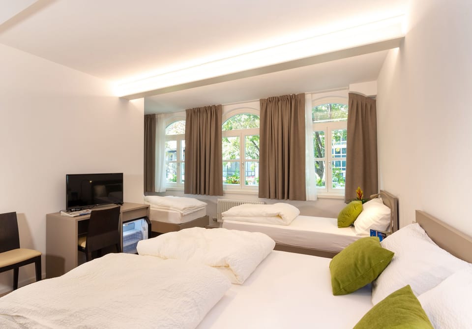 Family Room | Minibar, individually furnished, desk, laptop workspace