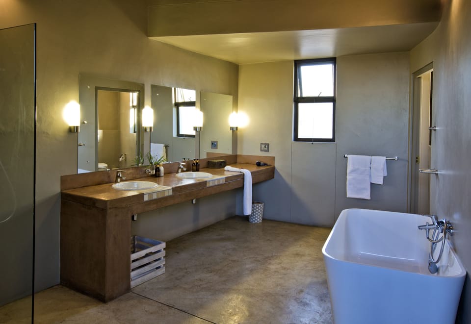 Separate tub and shower, rainfall showerhead, towels, soap