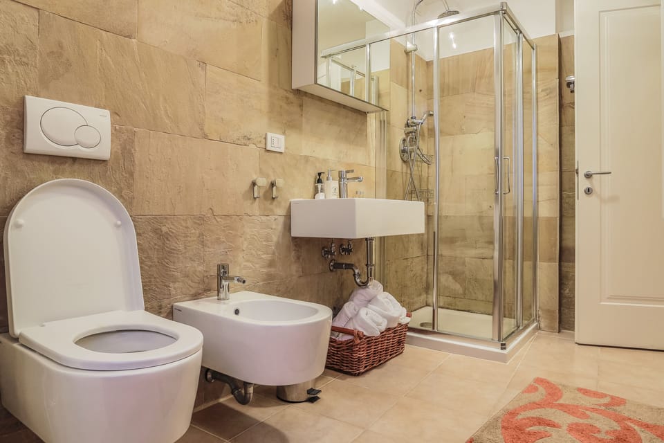 Apartment, 1 Bedroom | Bathroom | Shower, free toiletries, hair dryer, bidet