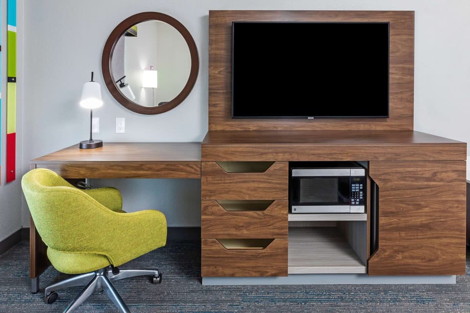 In-room safe, desk, iron/ironing board, cribs (free)