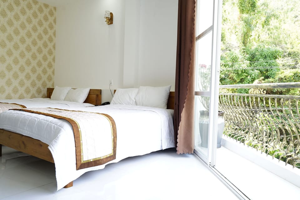 Standard Quadruple Room, 2 Queen Beds, Balcony, Mountain View | Minibar, soundproofing, WiFi (free), bed sheets