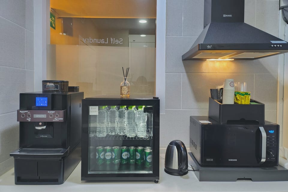 Mini-fridge, microwave, electric kettle, coffee grinder