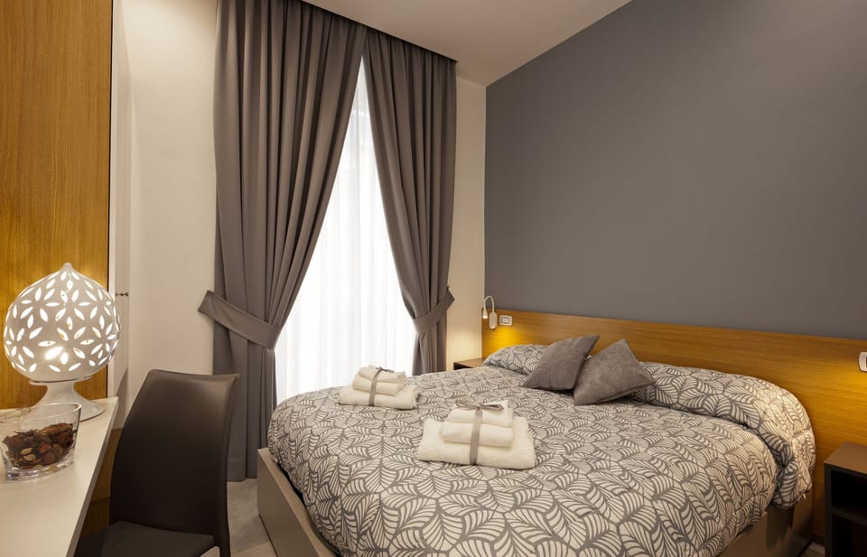 Premium bedding, down comforters, memory foam beds, desk