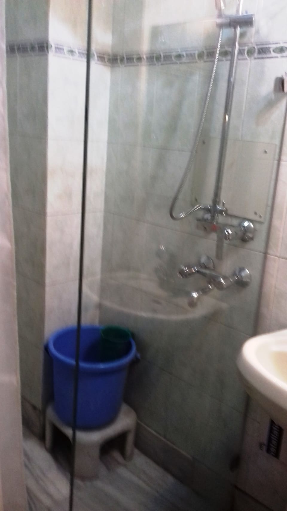 Deluxe Quadruple Room, Lake View | Bathroom | Shower, free toiletries, slippers, towels