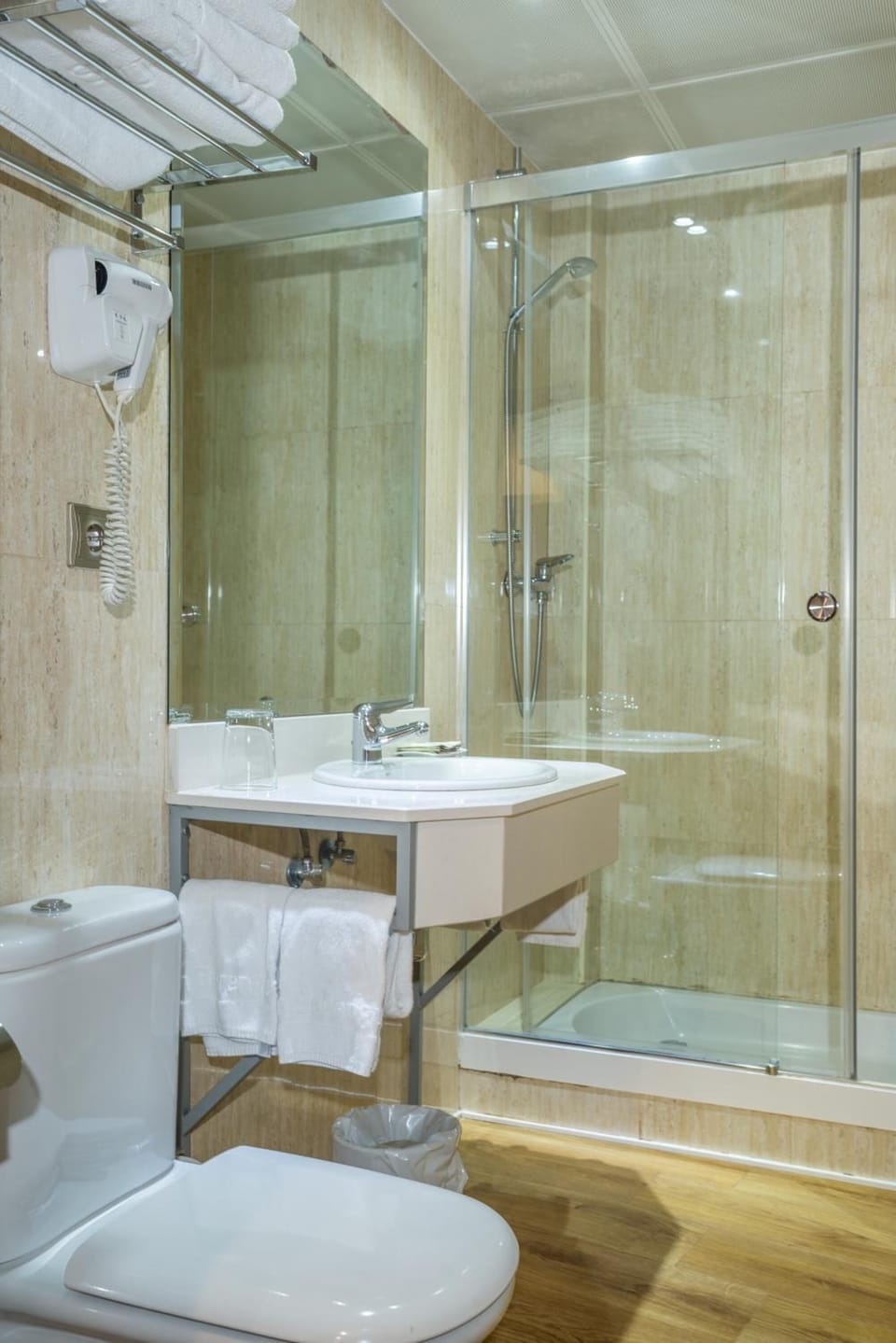 Bathtub, hair dryer, towels