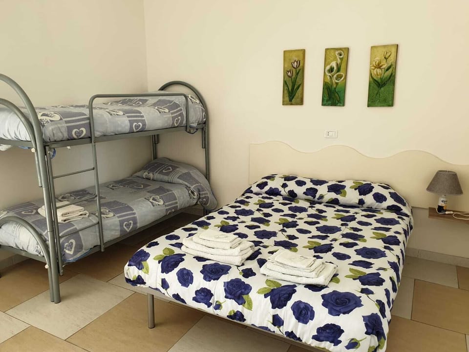 Comfort Quadruple Room, City View | Desk, laptop workspace, blackout drapes, cribs (free)
