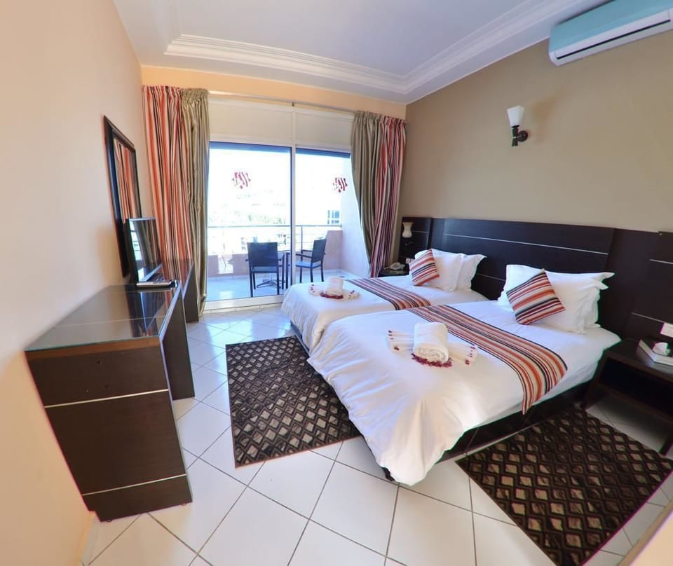 Standard Room | Premium bedding, laptop workspace, blackout drapes, cribs (free)
