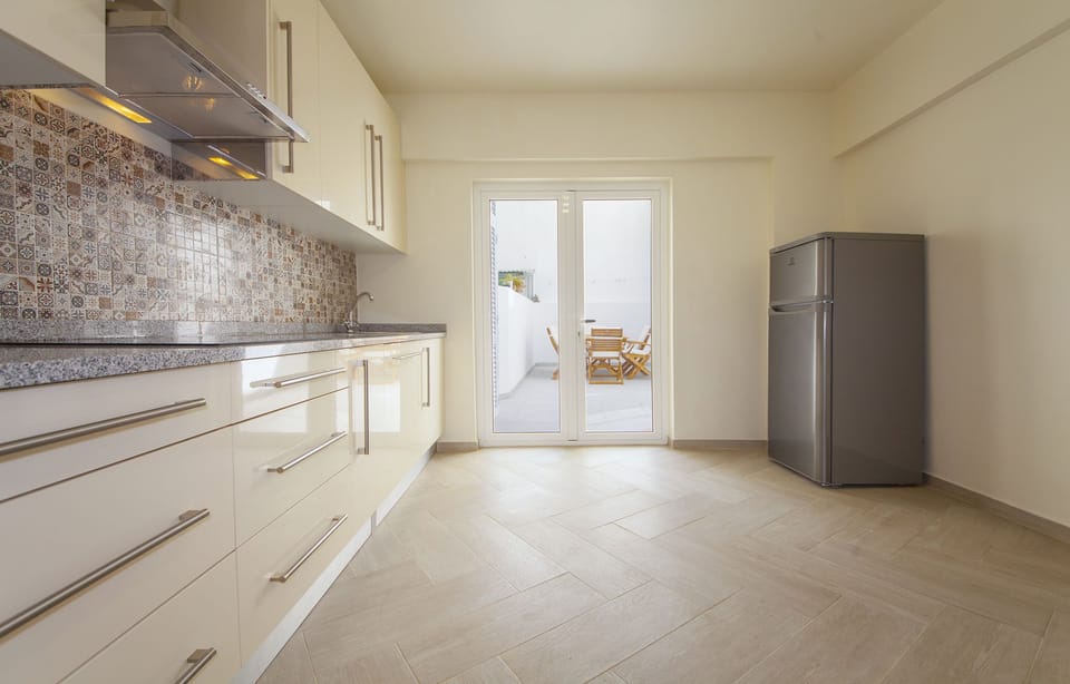 Apartment, 3 Bedrooms | Private kitchen | Full-size fridge, microwave, oven, stovetop