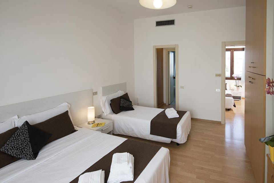 Quadruple Room | Desk, laptop workspace, cribs/infant beds, rollaway beds
