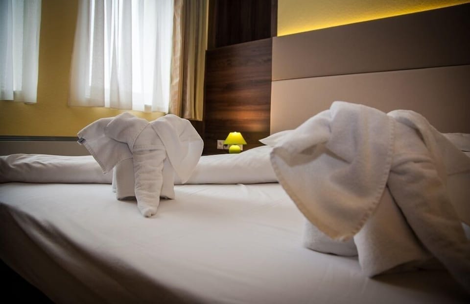 Double or Twin Room | 1 bedroom, minibar, in-room safe, blackout drapes