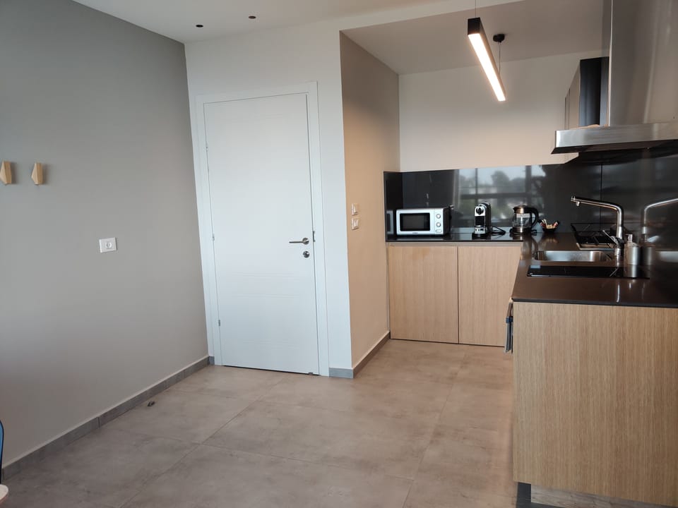 Luxury Apartment, Sea View | Private kitchen | Espresso maker, coffee/tea maker, electric kettle