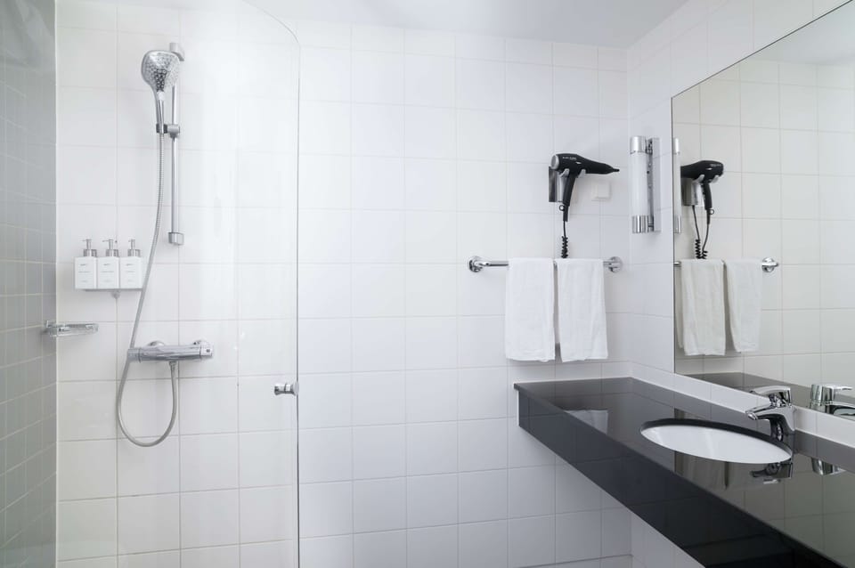 Shower, free toiletries, hair dryer, towels