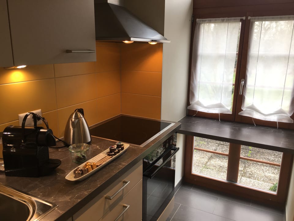 Suite (Louis Rivier) | Private kitchen | Espresso maker, electric kettle, highchair