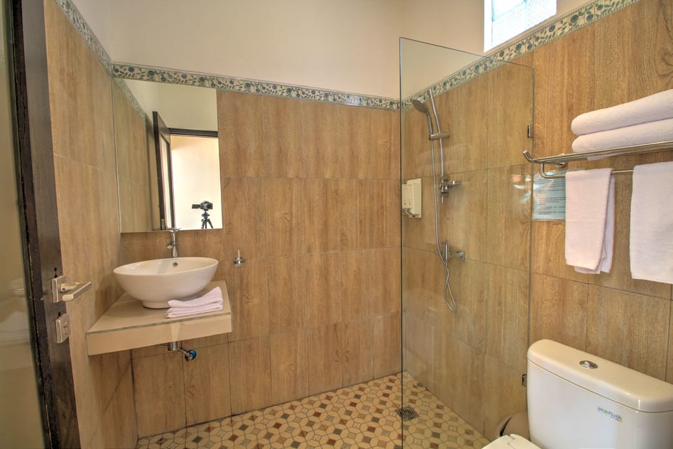 Shower, towels, soap, shampoo