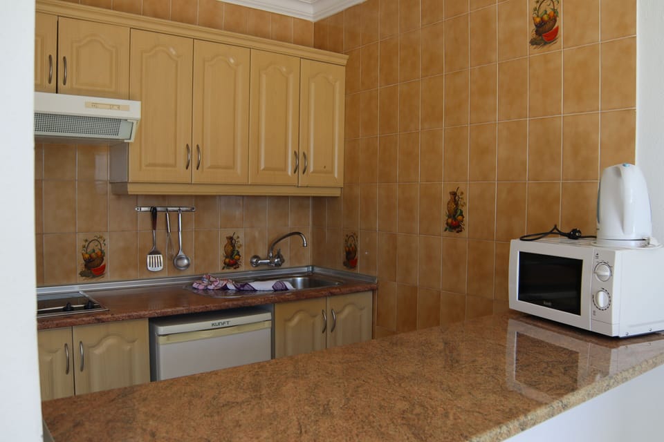 Apartment, 1 Bedroom, Balcony | Private kitchen | Full-size fridge, stovetop, electric kettle, toaster