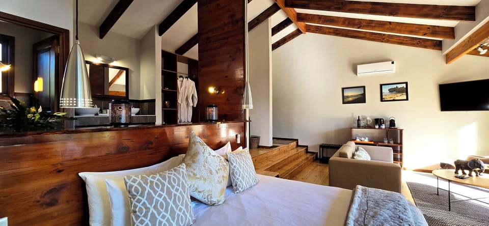 Executive Suite, 1 King Bed, Lagoon View | Living area | 42-inch Smart TV with satellite channels