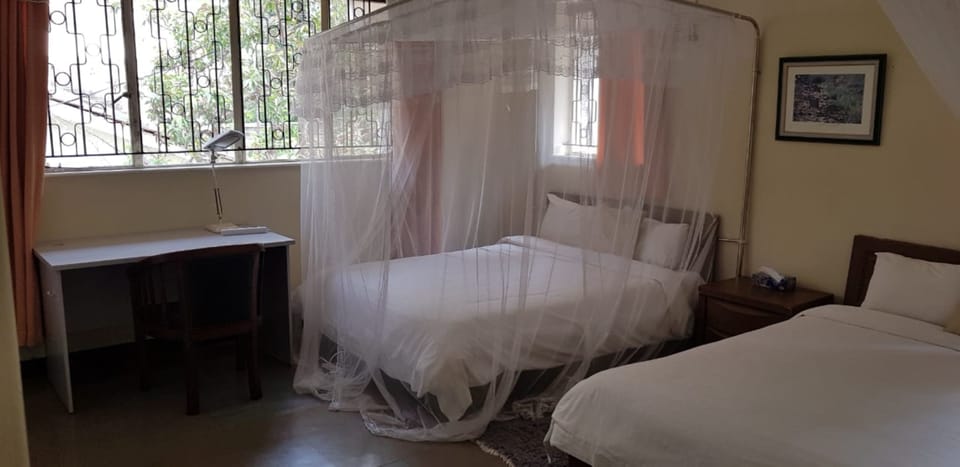 Triple Room | Premium bedding, memory foam beds, desk, free WiFi